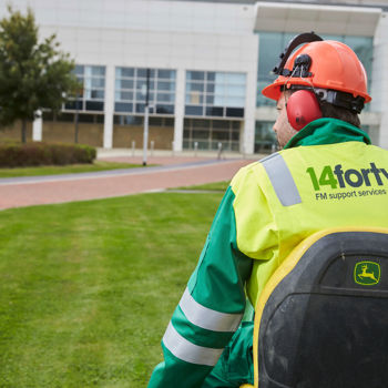 A member of the 14forty outdoor hard facilities management team performing maintenance work.
